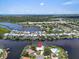 Breathtaking waterfront estate features lush surroundings, serene water views, and easy access to water activities at 1461 Marlin St, Nokomis, FL 34275