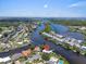 Expansive waterfront property featuring multiple canals, beautiful residences, lush greenery and easy access to water activities at 1461 Marlin St, Nokomis, FL 34275