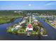 Waterfront home offers stunning aerial views and convenient access to the water and surrounding community at 1461 Marlin St, Nokomis, FL 34275