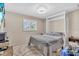 Minimalist bedroom with a window and neutral tones at 1461 Marlin St, Nokomis, FL 34275