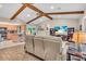 Open-concept living room seamlessly connects to the kitchen with views of the backyard pool at 1461 Marlin St, Nokomis, FL 34275