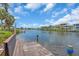 Beautiful waterfront view showcasing a private dock and serene waterway surrounded by luxurious homes at 1461 Marlin St, Nokomis, FL 34275