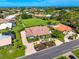 Stunning aerial view of the home showcasing its beautiful landscaping and desirable neighborhood location at 1484 Seafarer Dr, Osprey, FL 34229