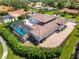 Aerial view featuring a screened in pool and beautifully landscaped backyard of this lovely home at 1484 Seafarer Dr, Osprey, FL 34229