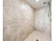 Tiled walk-in shower featuring a rain shower head and modern design at 1484 Seafarer Dr, Osprey, FL 34229