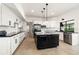 Beautiful kitchen with an island, stainless steel appliances, granite counters and subway tile backsplash at 1484 Seafarer Dr, Osprey, FL 34229