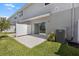 Private patio with sliding glass door, offering a serene outdoor living space at 16652 Bergamo Pl, Bradenton, FL 34211
