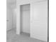 Bright bedroom featuring a closet with a sliding door, offering ample storage space at 16652 Bergamo Pl, Bradenton, FL 34211
