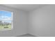 Bright bedroom with a view of the outside from the window at 16652 Bergamo Pl, Bradenton, FL 34211