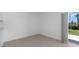A cozy dining area featuring tile floors and sliding glass doors to the backyard at 16652 Bergamo Pl, Bradenton, FL 34211