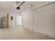 Spacious two car garage with concrete flooring, ready for your vehicles and storage at 16652 Bergamo Pl, Bradenton, FL 34211