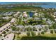 Aerial view showcasing the home's prime location within a lush community with ponds at 1684 Pintail Way, Sarasota, FL 34231