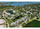 Stunning aerial perspective of the community, emphasizing the scenic ponds and surrounding greenery at 1684 Pintail Way, Sarasota, FL 34231