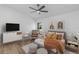 Bright bedroom featuring a ceiling fan, neutral paint, and modern furnishings and decor at 1684 Pintail Way, Sarasota, FL 34231