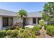 Inviting front entrance with well-maintained landscaping and a quaint walkway to the front door at 1684 Pintail Way, Sarasota, FL 34231