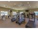 Well-equipped gym featuring treadmills, elliptical machines, and weight training equipment at 1684 Pintail Way, Sarasota, FL 34231