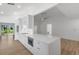 Spacious, modern kitchen with an island, updated appliances, and open flow to the living area at 1684 Pintail Way, Sarasota, FL 34231