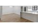 Bright living space with an island bar connected to a modern kitchen and dining area at 1684 Pintail Way, Sarasota, FL 34231