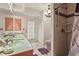 Bathroom featuring dual sinks, lots of countertop space, and walk-in shower with rainfall shower head at 20 Idle Sands Dr, Venice, FL 34293