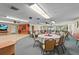 Spacious community room with ample seating and tables, perfect for gatherings at 20 Idle Sands Dr, Venice, FL 34293