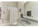Traditional bathroom with shower-tub combo, single sink vanity, and a framed mirror at 208 147Th Ne St, Bradenton, FL 34212