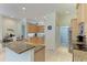 Bright kitchen featuring granite countertops, ample cabinet space, and modern appliances for a delightful cooking experience at 208 147Th Ne St, Bradenton, FL 34212