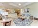 Inviting living room with tile flooring, neutral colors, and open layout at 208 147Th Ne St, Bradenton, FL 34212