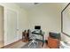 Functional home office features a modern desk setup and an additional workspace, ideal for productivity at 208 147Th Ne St, Bradenton, FL 34212