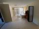 Cozy bedroom with tile floors and ample natural light from the window at 2115 Temple St, Sarasota, FL 34239