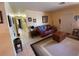 Comfortable living room showcasing tile flooring, complemented by a stylish leather sofa and neutral decor at 2115 Temple St, Sarasota, FL 34239