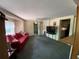 Cozy living room area with ceiling fan at 2115 Temple St, Sarasota, FL 34239