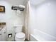 Bathroom with granite countertops, and a bath tub with tiled walls at 2220 Bahia Vista St # G4, Sarasota, FL 34239