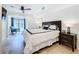 Bedroom with a ceiling fan, tiled flooring, and a sliding glass door to the outside at 2220 Bahia Vista St # G4, Sarasota, FL 34239