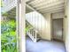 Outdoor entrance featuring a small staircase leading to the upper level and the front door at 2220 Bahia Vista St # G4, Sarasota, FL 34239