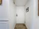 Foyer with neutral paint, a decorative framed art piece and stone tile flooring at 2220 Bahia Vista St # G4, Sarasota, FL 34239