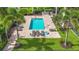 Relaxing community pool offers an inviting space with ample seating for soaking up the sun at 2220 Bahia Vista St # G4, Sarasota, FL 34239