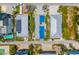 Aerial view of the home featuring solar panels, a pool and a fenced yard at 2513 Avenue B # B, Bradenton Beach, FL 34217