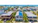Charming home with a blue roof, a front porch and easy access to a beautiful beach at 2513 Avenue B # B, Bradenton Beach, FL 34217