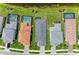 Aerial view of multiple homes and lots, showing the landscape and layout of the neighborhood at 2565 Star Apple Way, Sarasota, FL 34240