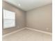 Bright and spacious bedroom with neutral tones and ample natural light at 2565 Star Apple Way, Sarasota, FL 34240