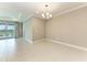 Open floor plan with view of dining room adjacent to living room and outdoor view at 2565 Star Apple Way, Sarasota, FL 34240