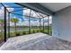 Screened in patio with brick pavers offering picturesque outdoor living and tranquil water views at 2565 Star Apple Way, Sarasota, FL 34240