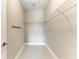 Walk-in closet with built-in shelving and ample storage space at 2565 Star Apple Way, Sarasota, FL 34240