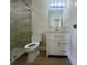 Bathroom featuring a glass-enclosed shower and a white vanity with drawers at 2636 Hidden Lake N Dr # G, Sarasota, FL 34237
