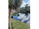View of a pond with lily pads and reflections at 2636 Hidden Lake N Dr # G, Sarasota, FL 34237