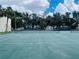Outdoor tennis court with net at 2636 Hidden Lake N Dr # G, Sarasota, FL 34237