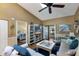Comfortable living room showcasing modern decor, open doorway to bedroom, and sliding door to lanai at 2904 64Th W St # 2904, Bradenton, FL 34209