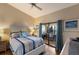 Comfortable main bedroom with sliding glass doors to the office at 2904 64Th W St # 2904, Bradenton, FL 34209
