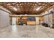 Interior shot of the garage, highlighting the open layout, storage cabinets, and roll-up doors at 3045 Logue Rd, Myakka City, FL 34251