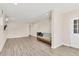 Spacious finished interior with light grey vinyl flooring and bright white walls at 3045 Logue Rd, Myakka City, FL 34251